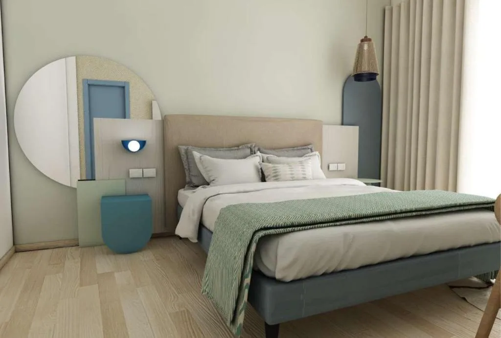 Camera dal design contemporaneo con dettagli blu e verde e testiera imbottita